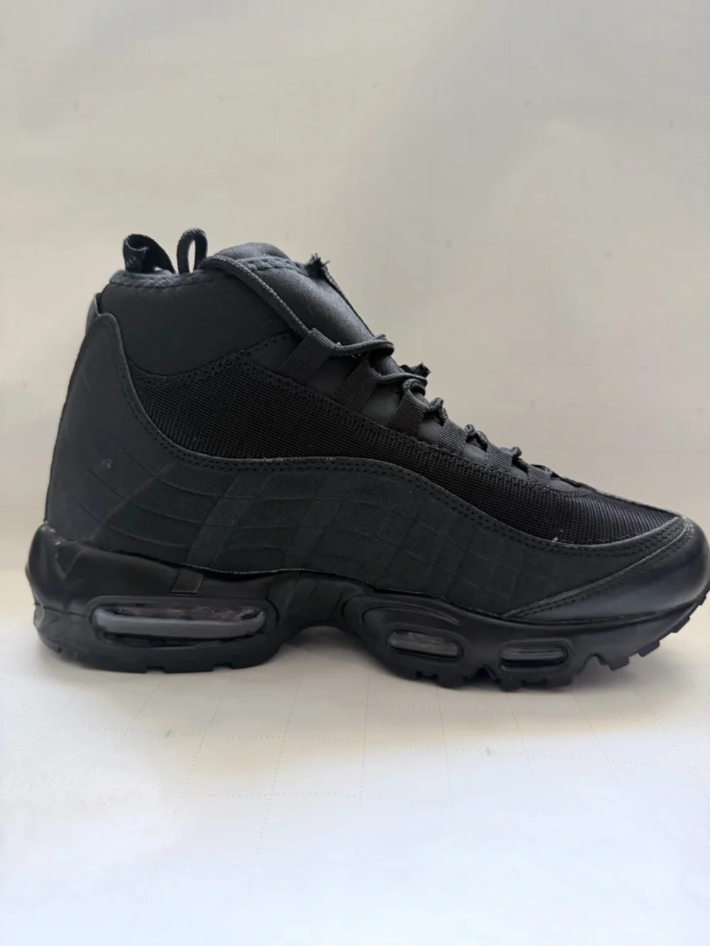 Nike All-Black High-Top Air-Cushioned Sneaker